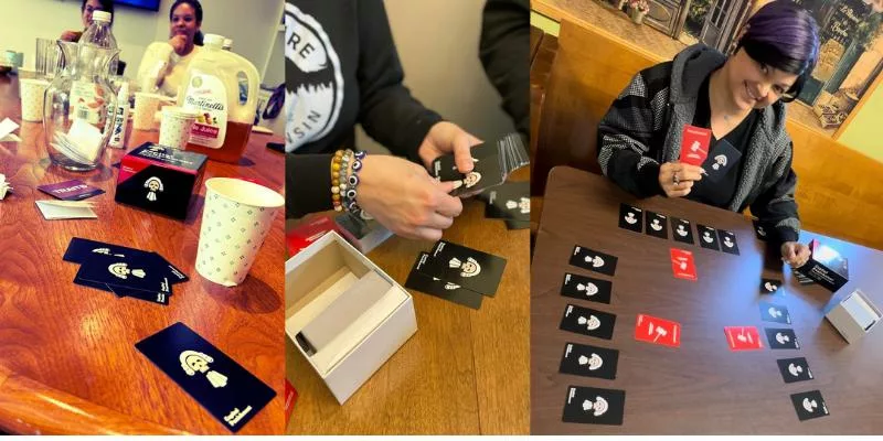 People playing the Capital punishment card game at a table, with drinks and snacks visible in a casual setting.